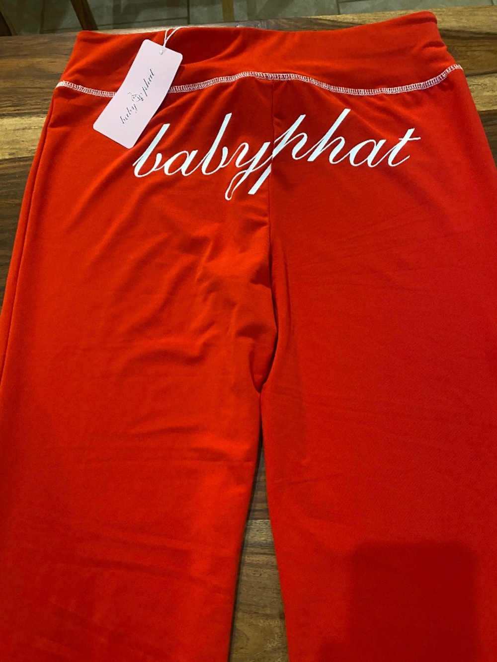 Baby Phat red flare leggings. NWT. Size M